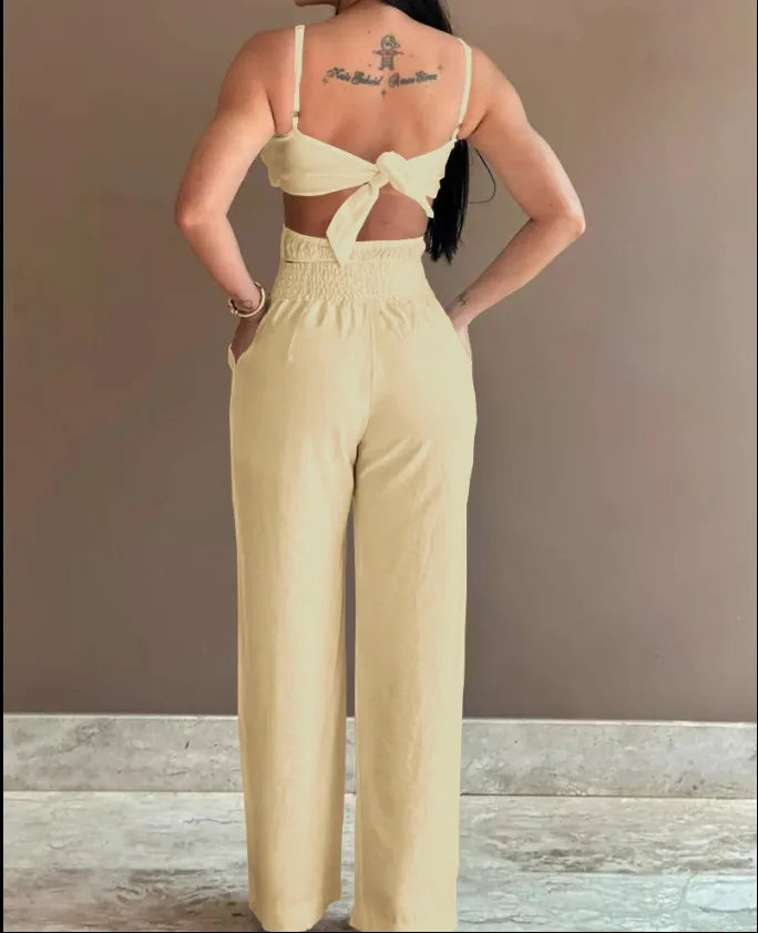 2026 Summer Spaghetti Strap Fashion Jumpsuit Women's Floral Pattern Hollow Casual Asymmetrical Collar Backless Jumpsuit Trousers